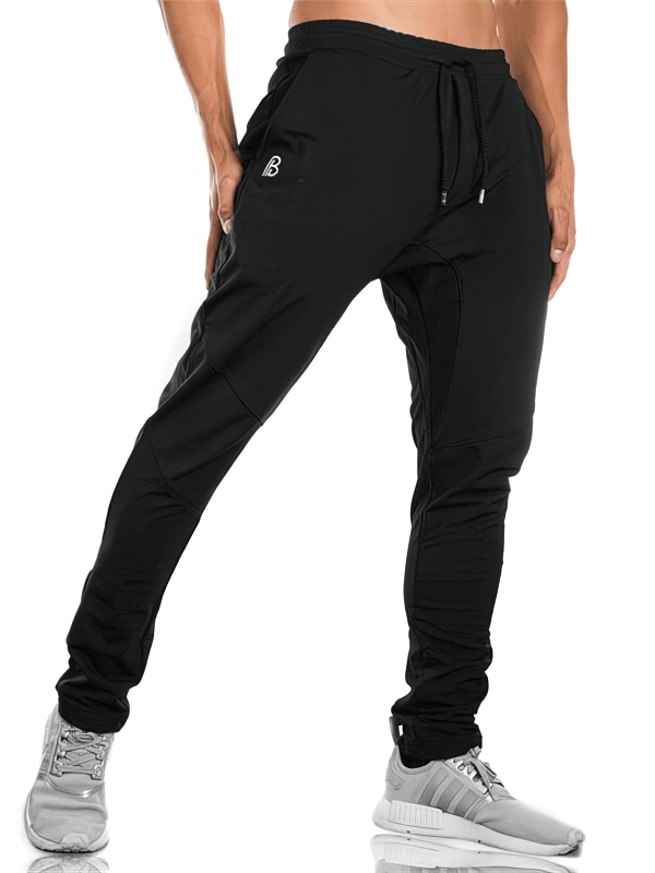 Men's sports elastic quick-drying pants with pockets, black full-length design, perfect for workouts, with comfortable fit.